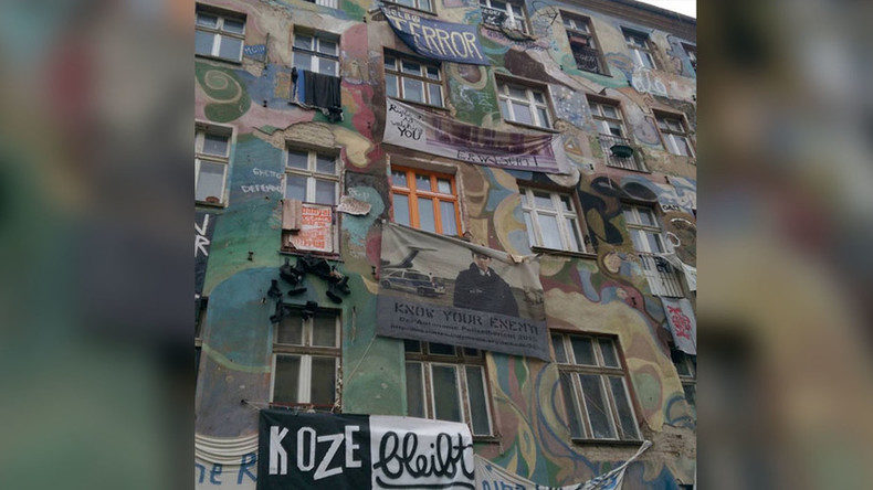 Click to enlarge squatter building