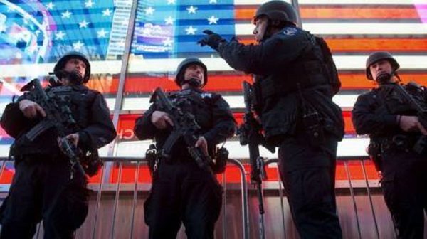 Police standing near US flag