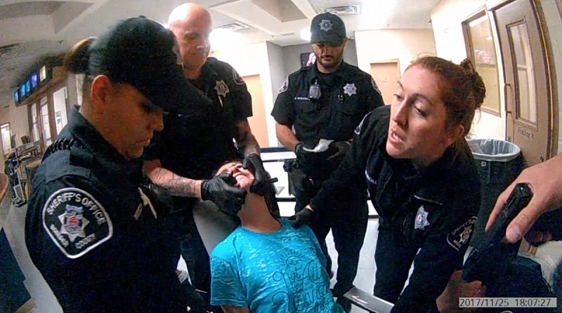 Lauren Gotthelf restrained