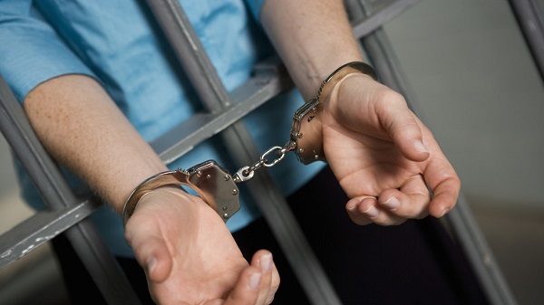 Click to enlarge Handcuffed