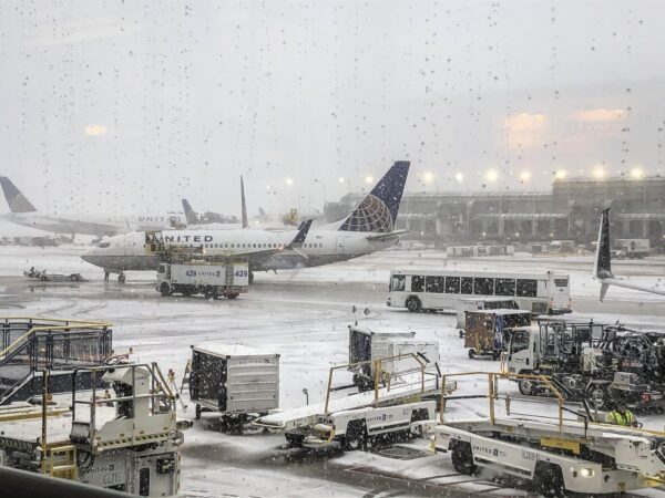 Snow falls on the United Terminal at O’Hare Airport in Chicago on the morning of Nov. 11, 2019.
