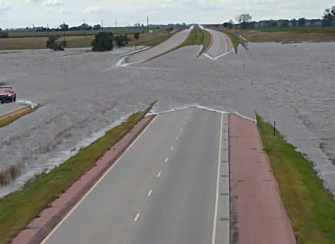 Flood waters run over Interstate 90, two miles west of Mt. Vernon on Thursday, Sept. 12.