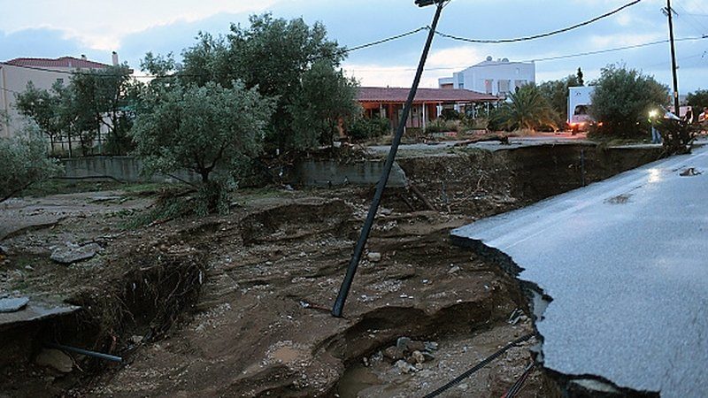Torrential rains left damages in the town of Kineta, some 50 km southwest of Athens