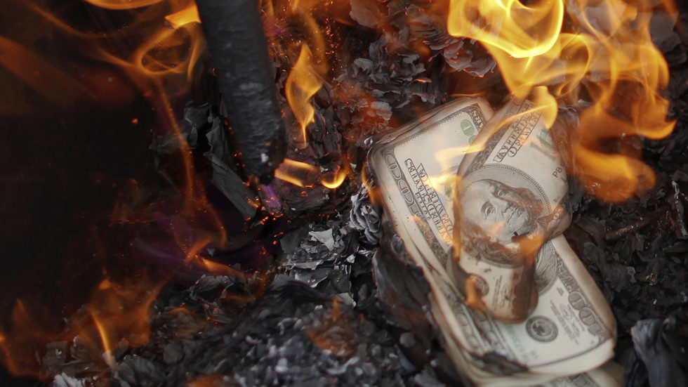 Click to enlarge burning money