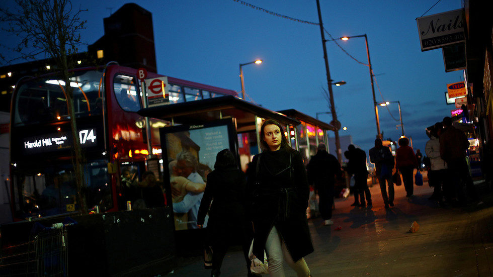 woman bus stop london