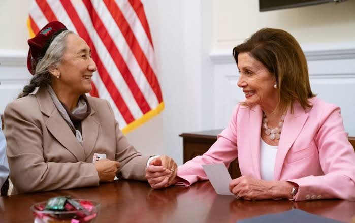 Pelosi with an Uyghur representative