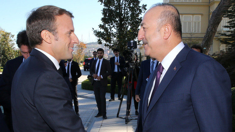 Click to enlarge Macron Cavusoglu