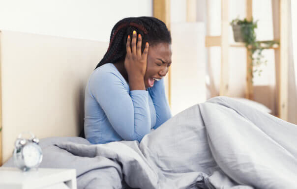Woman waking from a nightmare