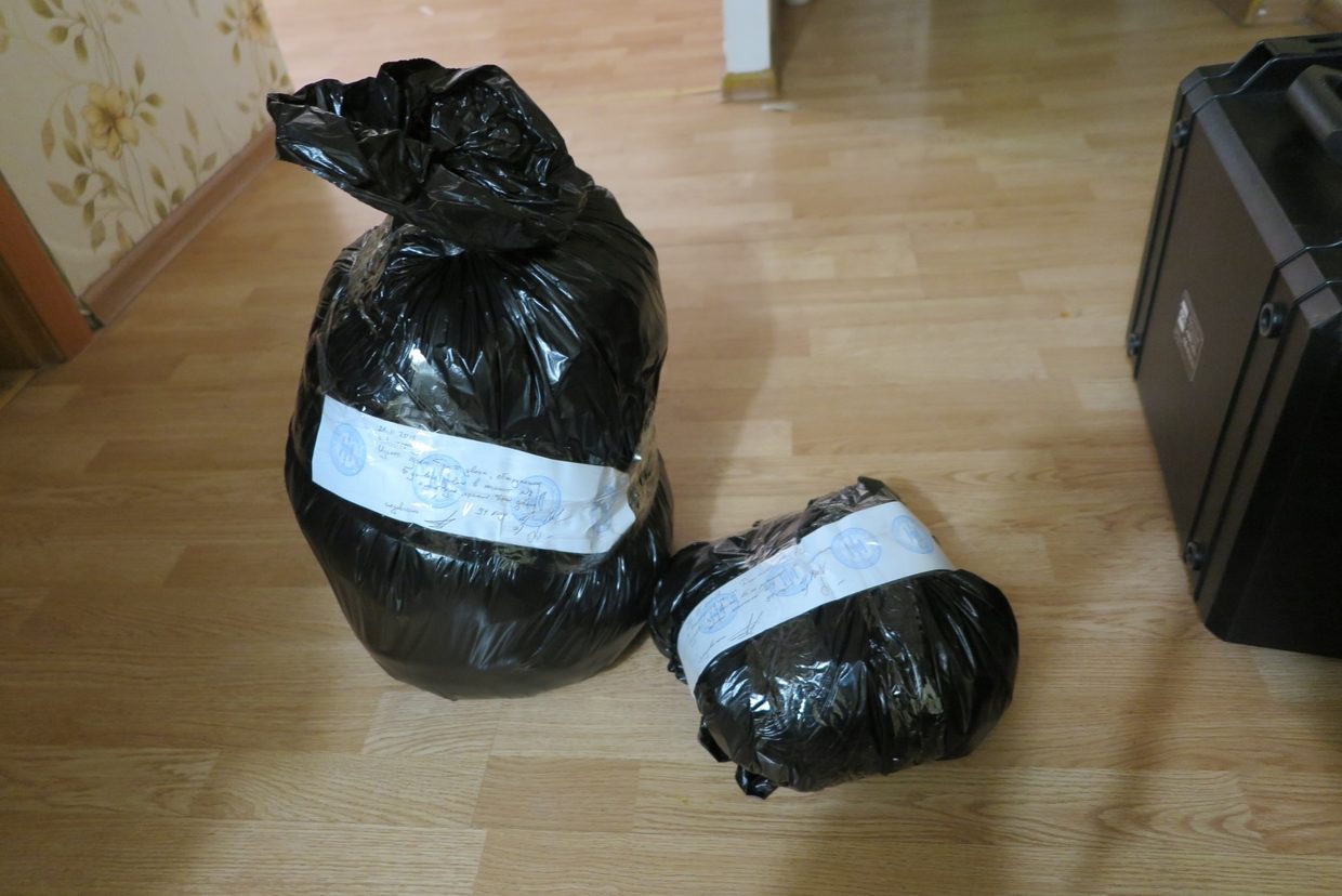 Bags with evidence pictured at the crime scene.