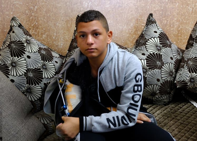 child wounded israeli sniper