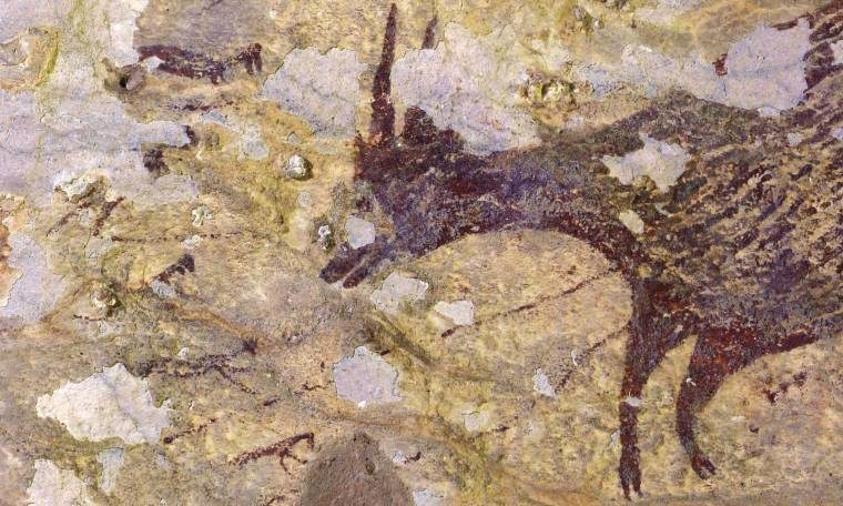 oldest cave art indonesia