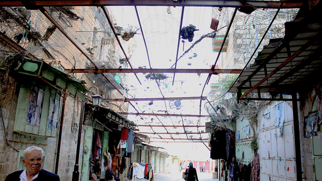 Click to enlarge hebron settlers garbage nets