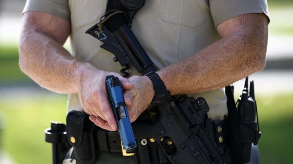 Click to enlarge Shooter with pistol