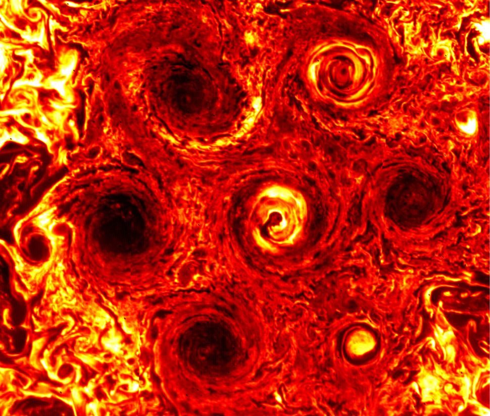 A new, smaller cyclone can be seen at the lower right of this infrared image of Jupiter's south pole