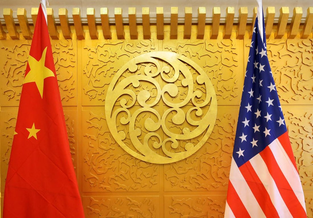 Click to enlarge Chinese and U.S. flags