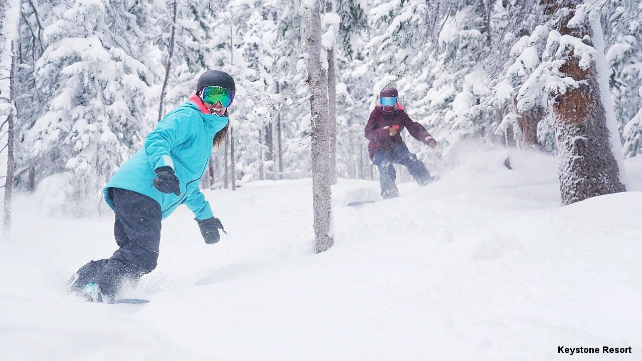 Click to enlarge Snowboarding on fresh powder at Keystone Mountain Resort
