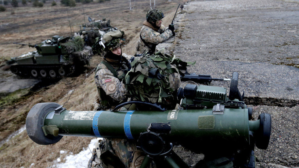 Click to enlarge Latvian army soldiers attend the NATO exercise