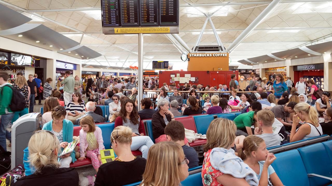 Click to enlarge airport crowds