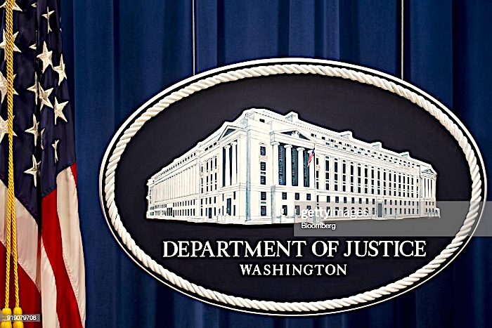 Click to enlarge DOJ sign