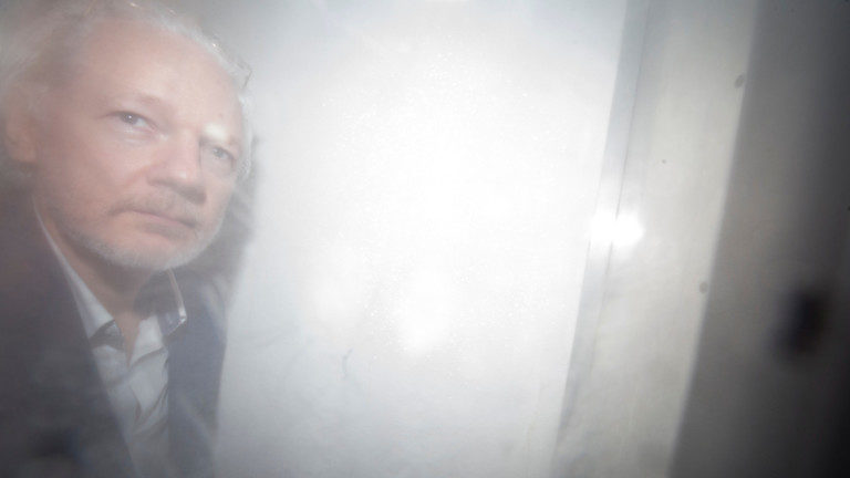 Click to enlarge Assange