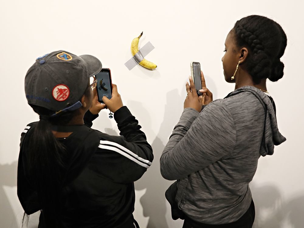 Click to enlarge Banana taped to the wall - called Art