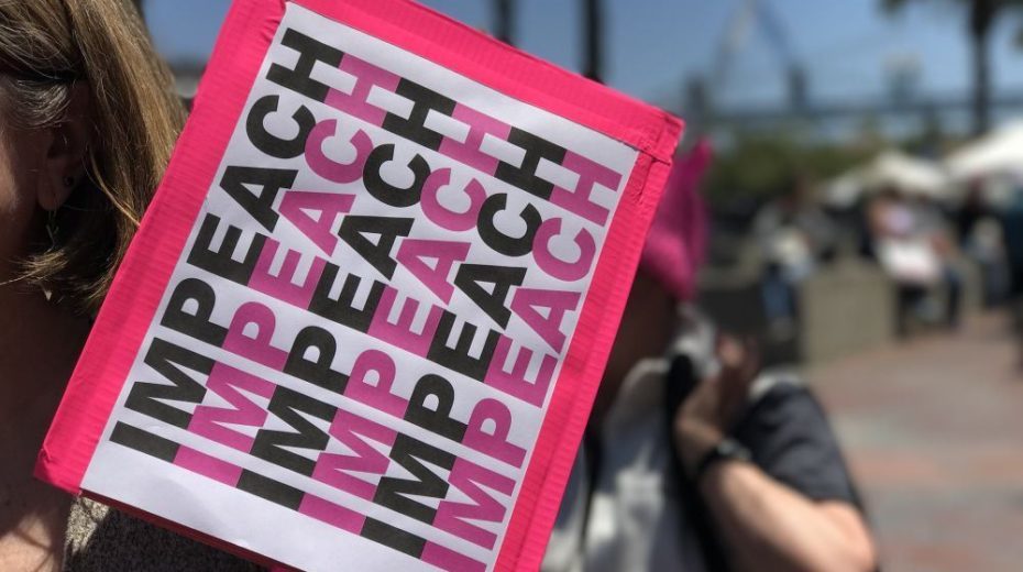 pink impeachment sign