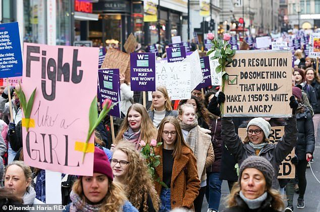 Demonstrators take part in 'Women Demand Bread & Roses' protest organised by Women's March in central London, January 19