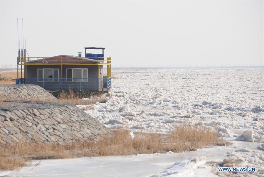 the frozen Linhe section of the Yellow River in Bayan Nur City