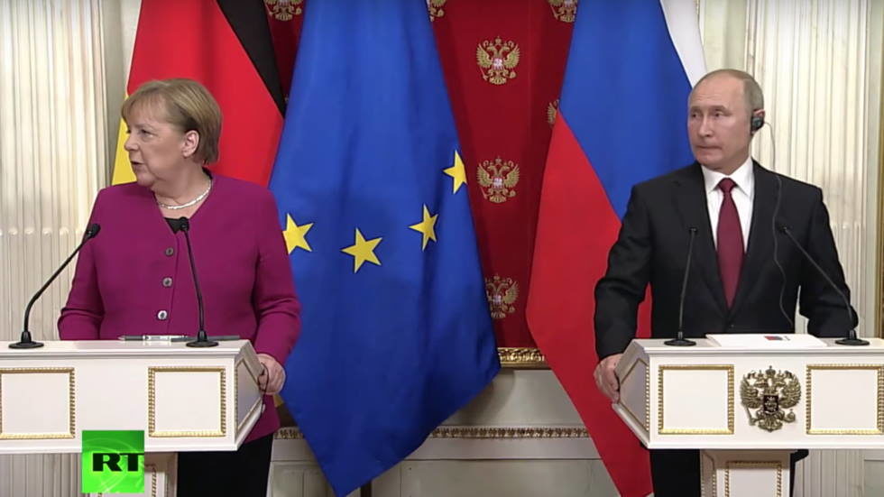 Putin Merkel