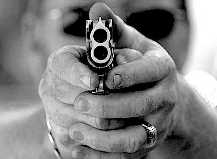 Click to enlarge Person aiming gun