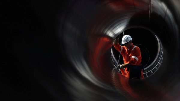 Click to enlarge A worker during construction