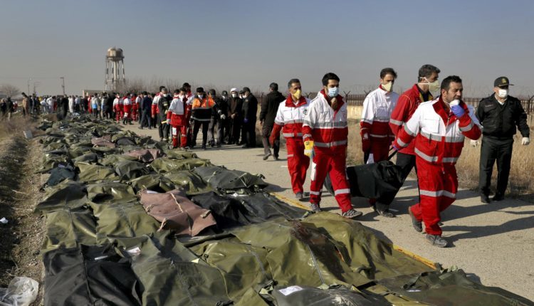Click to enlarge bodies ukraine flight 752