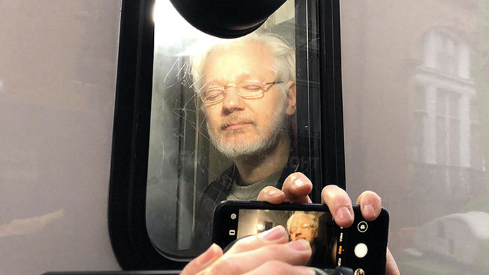 Click to enlarge Assange