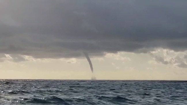 Click to enlarge Waterspout swirls off Florida's southeast coast