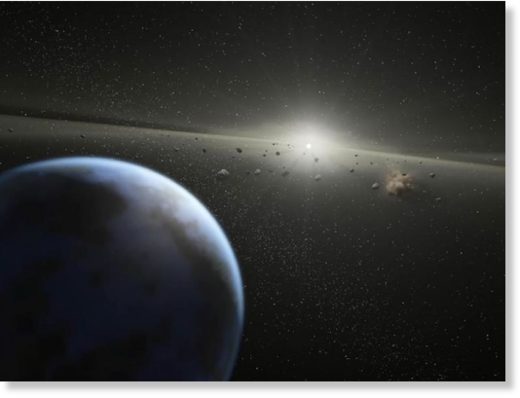 Click to enlarge This artist's animation illustrates a massive asteroid belt in orbit around a star the same age and size as our Sun.