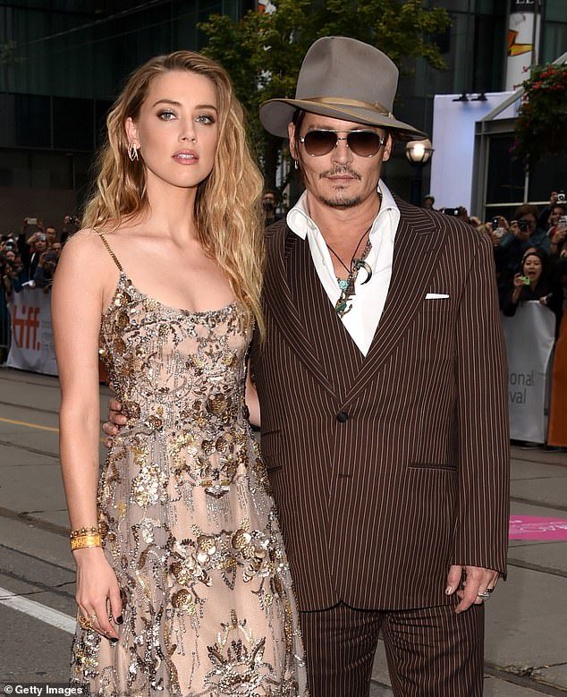 Click to enlarge Amber Heard Johnny Depp