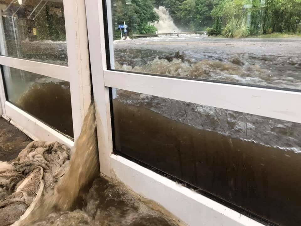Floodwaters at the Milford visitors’ terminal 03 February, 2020.
