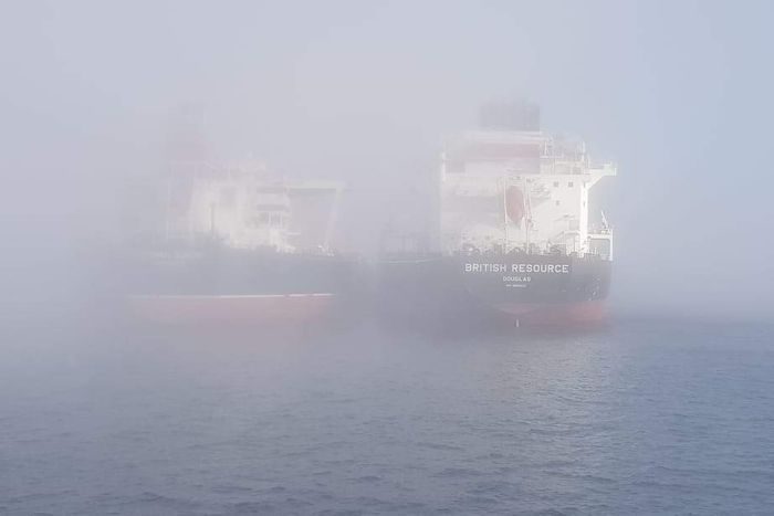 Click to enlarge Container ships at Fremantle Port were shrouded in the heavy fog
