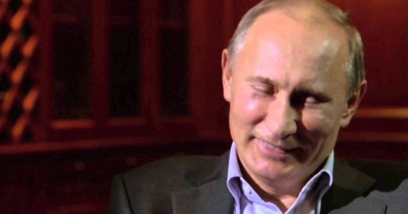 Putin laughing