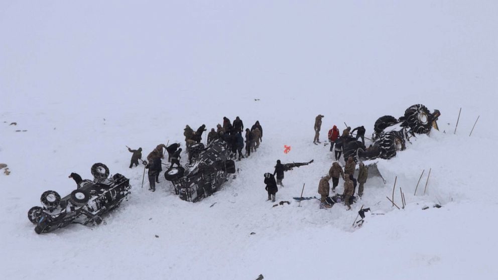 The bodies of more than two dozen rescue workers and civilians were discovered in Van province, where they had been helping dig out a minibus buried by a first avalanche late Tuesday