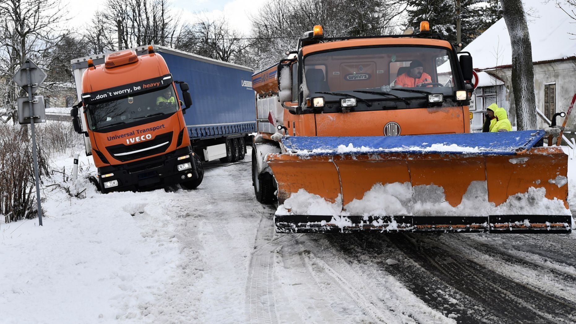 Click to enlarge A snowplow pulls a truck stranded along a snow-covered road in the village of Naklerov, Czech Republic, Wednesday, Feb. 5, 2020.