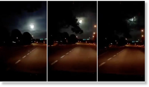 A fiery ball of light plummets through the sky as seen from Johor Bahru, Malaysia, in a dashboard camera recording.