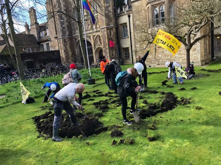 Click to enlarge extinction rebellion digging lawn cambridge