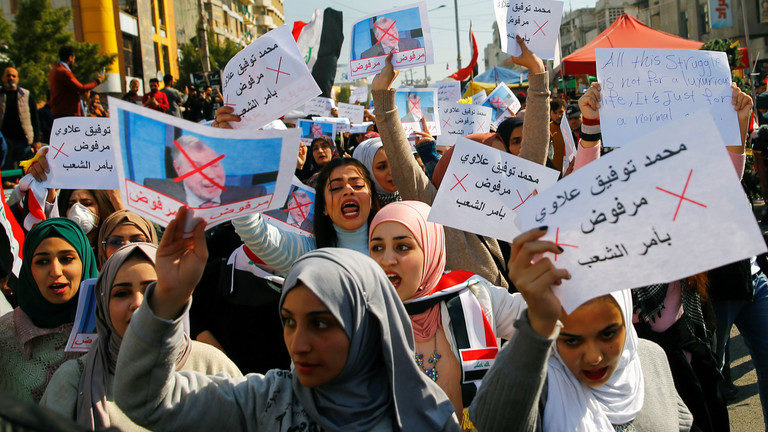 Click to enlarge An anti-government protest in Baghdad
