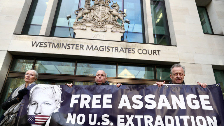 Click to enlarge Assange