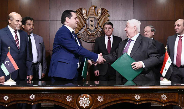Click to enlarge Muallem and Libya dignitaries