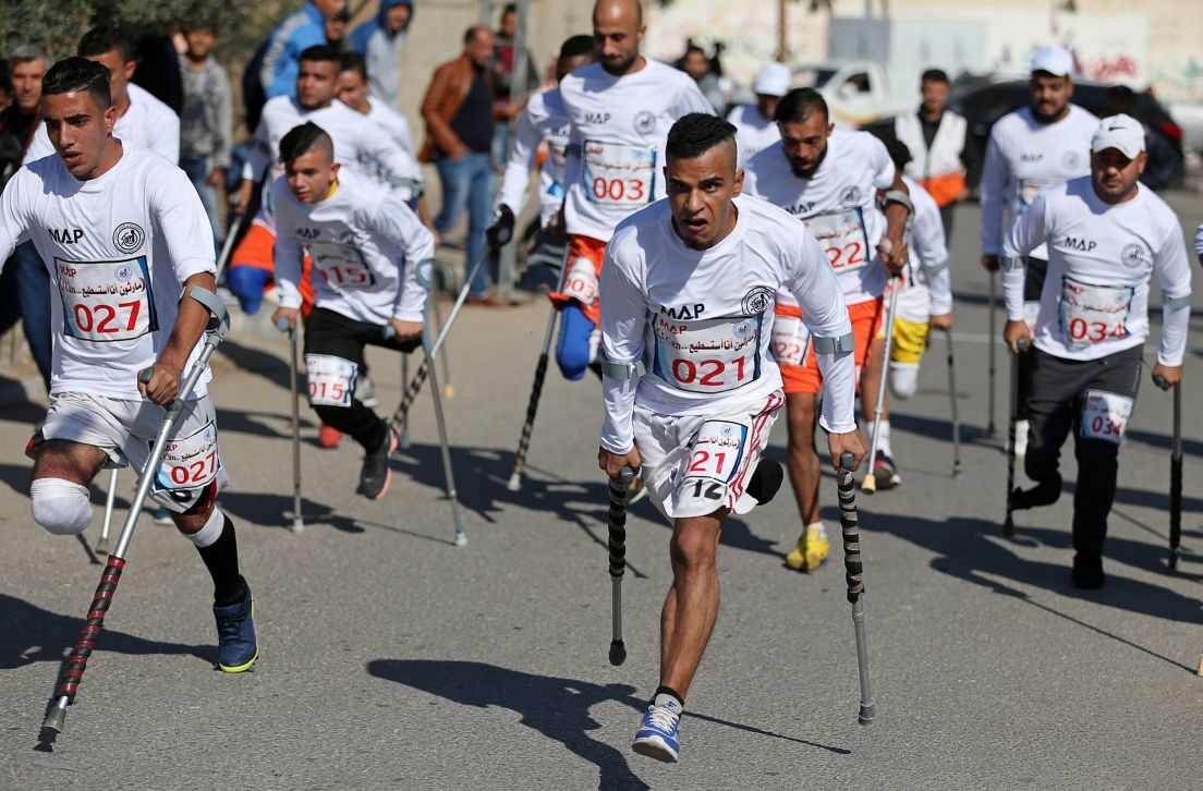 Palestinian amputees compete in a local run