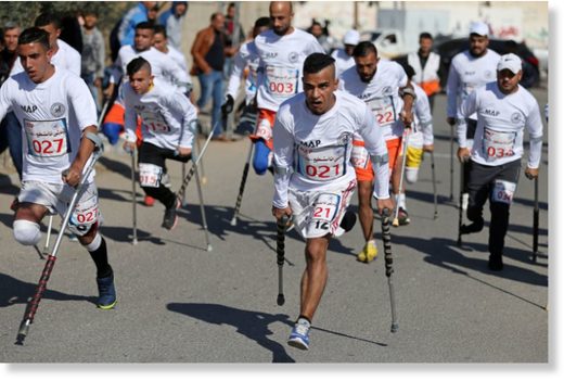 Palestinian amputees compete in a local run