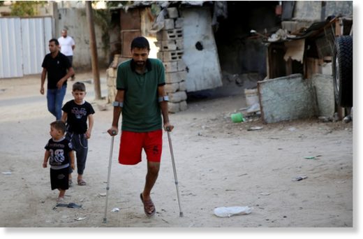 Click to enlarge Palestinian amputee