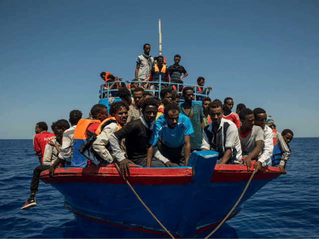 Click to enlarge migrants